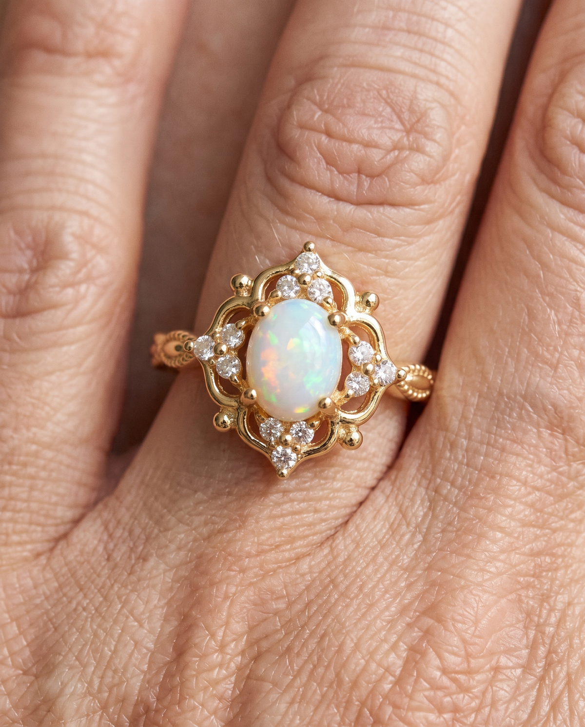 White Opal Baroque Gold Ring worn on a model