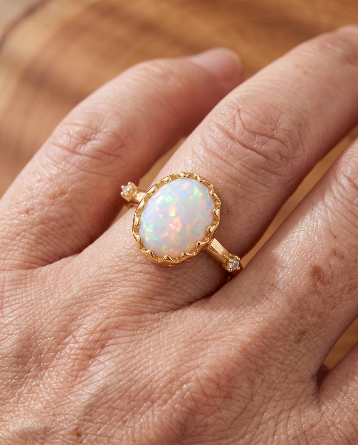 White Opal Dainty Gold Ring worn on a model